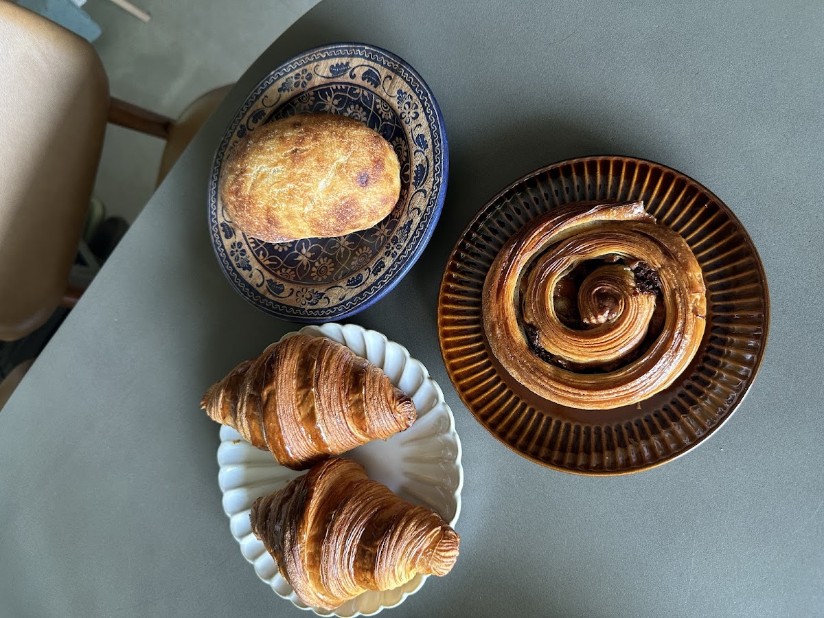A spread of Petit Pain pastries on the table