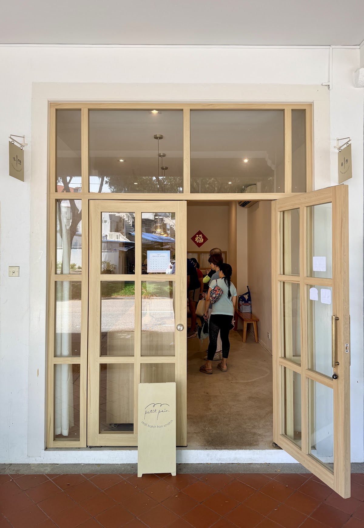 The shopfront door with the small batch from scratch sign